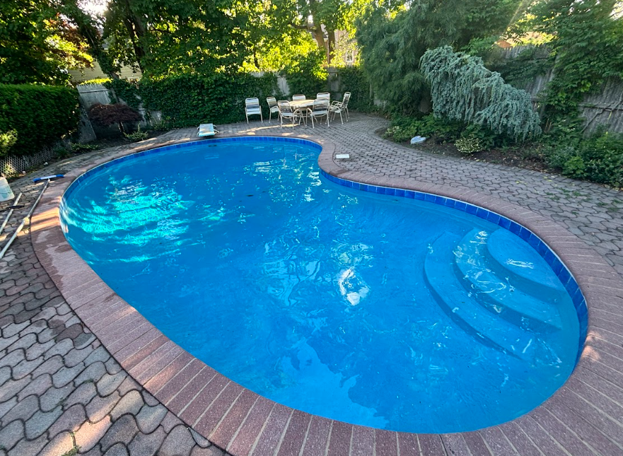 Crystal-clear pool water after professional cleaning service